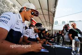 Lance Stroll (CDN) Williams and team mate Felipe Massa (BRA) Williams sign autographs for the fans. 08.06.2017. Formula 1 World Championship, Rd 7, Canadian Grand Prix, Montreal, Canada, Preparation Day.