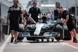 Mercedes AMG F1 W08 of Valtteri Bottas (FIN) Mercedes AMG F1 pushed down the pit lane. 08.06.2017. Formula 1 World Championship, Rd 7, Canadian Grand Prix, Montreal, Canada, Preparation Day.