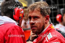 Sebastian Vettel (GER) Ferrari on the grid. 09.04.2017. Formula 1 World Championship, Rd 2, Chinese Grand Prix, Shanghai, China, Race Day.