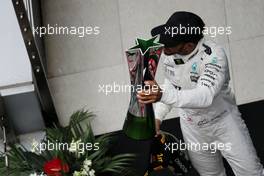 Race winner Lewis Hamilton (GBR) Mercedes AMG F1 celebrates on the podium. 09.04.2017. Formula 1 World Championship, Rd 2, Chinese Grand Prix, Shanghai, China, Race Day.