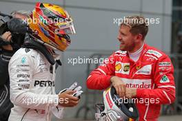 Lewis Hamilton (GBR) Mercedes AMG F1  and Sebastian Vettel (GER) Scuderia Ferrari  09.04.2017. Formula 1 World Championship, Rd 2, Chinese Grand Prix, Shanghai, China, Race Day.