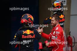 Max Verstappen (NLD) Red Bull Racing RB13 and Sebastian Vettel (GER) Ferrari SF70H. 09.04.2017. Formula 1 World Championship, Rd 2, Chinese Grand Prix, Shanghai, China, Race Day.
