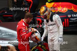 Sebastian Vettel (GER) Ferrari SF70H and Lewis Hamilton (GBR) Mercedes AMG F1 W08. 09.04.2017. Formula 1 World Championship, Rd 2, Chinese Grand Prix, Shanghai, China, Race Day.
