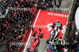 Sebastian Vettel (GER) Ferrari and Max Verstappen (NLD) Red Bull Racing celebrate on the podium. 09.04.2017. Formula 1 World Championship, Rd 2, Chinese Grand Prix, Shanghai, China, Race Day.