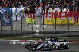 Marcus Ericsson (SWE) Sauber C36 and Romain Grosjean (FRA) Haas F1 Team VF-17 battle for position. 09.04.2017. Formula 1 World Championship, Rd 2, Chinese Grand Prix, Shanghai, China, Race Day.