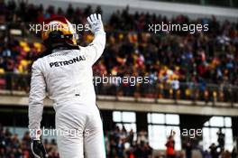 Lewis Hamilton (GBR) Mercedes AMG F1 celebrates his pole position in parc ferme. 08.04.2017. Formula 1 World Championship, Rd 2, Chinese Grand Prix, Shanghai, China, Qualifying Day.
