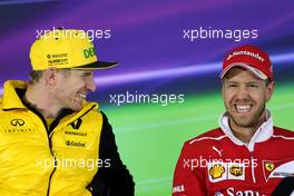 Sebastian Vettel (GER) Scuderia Ferrari and Nico Hulkenberg (GER) Renault Sport F1 Team  06.04.2017. Formula 1 World Championship, Rd 2, Chinese Grand Prix, Shanghai, China, Preparation Day.