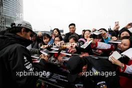Sergio Perez (MEX) Sahara Force India F1 signs autographs for the fans. 06.04.2017. Formula 1 World Championship, Rd 2, Chinese Grand Prix, Shanghai, China, Preparation Day.