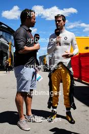 Jolyon Palmer (GBR) Renault Sport F1 Team with Ted Kravitz (GBR) Sky Sports Pitlane Reporter. 12.05.2017. Formula 1 World Championship, Rd 5, Spanish Grand Prix, Barcelona, Spain, Practice Day.