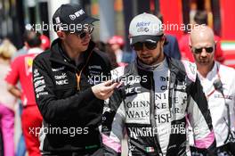 Sergio Perez (MEX) Sahara Force India F1 with Will Hings (GBR) Sahara Force India F1 Press Officer. 12.05.2017. Formula 1 World Championship, Rd 5, Spanish Grand Prix, Barcelona, Spain, Practice Day.