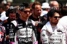 (L to R): Esteban Ocon (FRA) Sahara Force India F1 Team and Sergio Perez (MEX) Sahara Force India F1, as the grid observes the national anthem. 14.05.2017. Formula 1 World Championship, Rd 5, Spanish Grand Prix, Barcelona, Spain, Race Day.