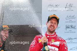 Sebastian Vettel (GER) Ferrari celebrates his second position with Daniel Ricciardo (AUS) Red Bull Racing on the podium. 14.05.2017. Formula 1 World Championship, Rd 5, Spanish Grand Prix, Barcelona, Spain, Race Day.
