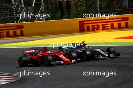Sebastian Vettel (GER) Ferrari SF70H and Lewis Hamilton (GBR) Mercedes AMG F1 W08 battle for the lead of the race. 14.05.2017. Formula 1 World Championship, Rd 5, Spanish Grand Prix, Barcelona, Spain, Race Day.