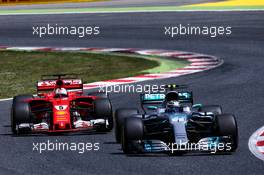 Valtteri Bottas (FIN) Mercedes AMG F1 W08 leads Sebastian Vettel (GER) Ferrari SF70H. 14.05.2017. Formula 1 World Championship, Rd 5, Spanish Grand Prix, Barcelona, Spain, Race Day.