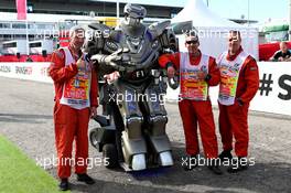 A robot with marshals in the paddock. 13.05.2017. Formula 1 World Championship, Rd 5, Spanish Grand Prix, Barcelona, Spain, Qualifying Day.