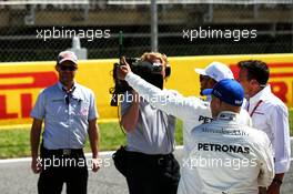 Pole sitter Lewis Hamilton (GBR) Mercedes AMG F1 with Valtteri Bottas (FIN) Mercedes AMG F1 and Will Buxton (GBR) NBC Sports Network TV Presenter on the main straight after qualifying. 13.05.2017. Formula 1 World Championship, Rd 5, Spanish Grand Prix, Barcelona, Spain, Qualifying Day.