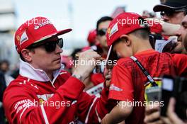 Kimi Raikkonen (FIN) Ferrari signs autographs for the fans. 11.05.2017. Formula 1 World Championship, Rd 5, Spanish Grand Prix, Barcelona, Spain, Preparation Day.