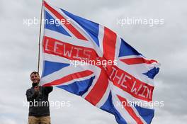 Lewis Hamilton (GBR) Mercedes AMG F1 fans with a flag. 14.07.2017. Formula 1 World Championship, Rd 10, British Grand Prix, Silverstone, England, Practice Day.