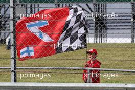 A young Kimi Raikkonen (FIN) Ferrari fan with a flag. 14.07.2017. Formula 1 World Championship, Rd 10, British Grand Prix, Silverstone, England, Practice Day.