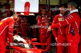 Sebastian Vettel (GER) Ferrari SF70H with the shield cockpit cover, looked at by Maurizio Arrivabene (ITA) Ferrari Team Principal (Right). 14.07.2017. Formula 1 World Championship, Rd 10, British Grand Prix, Silverstone, England, Practice Day.