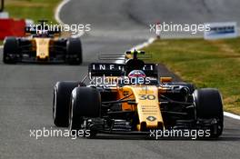 Jolyon Palmer (GBR) Renault Sport F1 Team RS17 and team mate Nico Hulkenberg (GER) Renault Sport F1 Team RS17. 14.07.2017. Formula 1 World Championship, Rd 10, British Grand Prix, Silverstone, England, Practice Day.