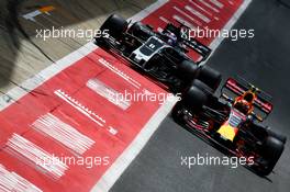Max Verstappen (NLD) Red Bull Racing RB13 and Romain Grosjean (FRA) Haas F1 Team VF-17. 14.07.2017. Formula 1 World Championship, Rd 10, British Grand Prix, Silverstone, England, Practice Day.