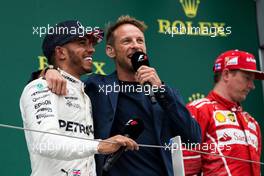 (L to R): Lewis Hamilton (GBR) Mercedes AMG F1 with Jenson Button (GBR) McLaren on the podium. 16.07.2017. Formula 1 World Championship, Rd 10, British Grand Prix, Silverstone, England, Race Day.