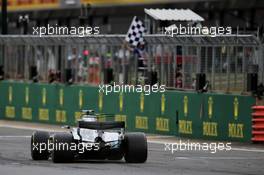 Race winner Lewis Hamilton (GBR) Mercedes AMG F1 W08 takes the chequered flag at the end of the race. 16.07.2017. Formula 1 World Championship, Rd 10, British Grand Prix, Silverstone, England, Race Day.