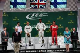 The podium (L to R): Valtteri Bottas (FIN) Mercedes AMG F1, second; Lewis Hamilton (GBR) Mercedes AMG F1, race winner; Kimi Raikkonen (FIN) Ferrari, third. 16.07.2017. Formula 1 World Championship, Rd 10, British Grand Prix, Silverstone, England, Race Day.