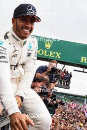 Race winner Lewis Hamilton (GBR) Mercedes AMG F1 celebrates with the fans. 16.07.2017. Formula 1 World Championship, Rd 10, British Grand Prix, Silverstone, England, Race Day.
