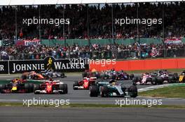 Lewis Hamilton (GBR) Mercedes AMG F1 W08 leads at the start of the race. 16.07.2017. Formula 1 World Championship, Rd 10, British Grand Prix, Silverstone, England, Race Day.