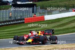 Max Verstappen (NLD) Red Bull Racing RB13 and Sergio Perez (MEX) Sahara Force India F1 VJM10 battle for position. 16.07.2017. Formula 1 World Championship, Rd 10, British Grand Prix, Silverstone, England, Race Day.