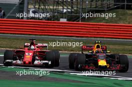 Max Verstappen (NLD) Red Bull Racing RB13 and Sebastian Vettel (GER) Ferrari SF70H battle for position. 16.07.2017. Formula 1 World Championship, Rd 10, British Grand Prix, Silverstone, England, Race Day.