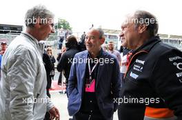 (L to R): Damon Hill (GBR) Sky Sports Presenter with Eddie Jones (AUS) England Rugby Union Team Head Coach, guest of the Sahara Force India F1 Team, and Robert Fernley (GBR) Sahara Force India F1 Team Deputy Team Principal. 15.07.2017. Formula 1 World Championship, Rd 10, British Grand Prix, Silverstone, England, Qualifying Day.