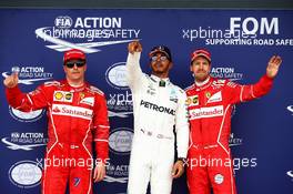 Qualifying top three in parc ferme (L to R): Kimi Raikkonen (FIN) Ferrari, second; Lewis Hamilton (GBR) Mercedes AMG F1, pole position; Sebastian Vettel (GER) Ferrari, third. 15.07.2017. Formula 1 World Championship, Rd 10, British Grand Prix, Silverstone, England, Qualifying Day.