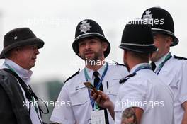 Police in the paddock. 15.07.2017. Formula 1 World Championship, Rd 10, British Grand Prix, Silverstone, England, Qualifying Day.