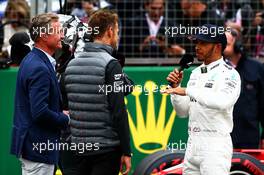 Pole sitter Lewis Hamilton (GBR) Mercedes AMG F1 with David Coulthard (GBR) Red Bull Racing and Scuderia Toro Advisor / Channel 4 F1 Commentator and Jenson Button (GBR) McLaren. 15.07.2017. Formula 1 World Championship, Rd 10, British Grand Prix, Silverstone, England, Qualifying Day.