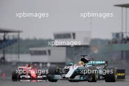 Lewis Hamilton (GBR) Mercedes AMG F1  and Sebastian Vettel (GER) Scuderia Ferrari  15.07.2017. Formula 1 World Championship, Rd 10, British Grand Prix, Silverstone, England, Qualifying Day.