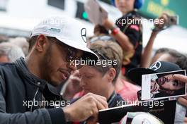 Lewis Hamilton (GBR) Mercedes AMG F1 signs autographs for the fans. 13.07.2017. Formula 1 World Championship, Rd 10, British Grand Prix, Silverstone, England, Preparation Day.
