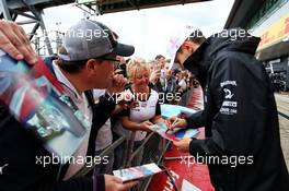 Esteban Ocon (FRA) Sahara Force India F1 Team signs autographs for the fans. 13.07.2017. Formula 1 World Championship, Rd 10, British Grand Prix, Silverstone, England, Preparation Day.