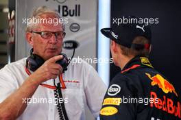 (L to R): Dr Helmut Marko (AUT) Red Bull Motorsport Consultant with Max Verstappen (NLD) Red Bull Racing. 28.07.2017. Formula 1 World Championship, Rd 11, Hungarian Grand Prix, Budapest, Hungary, Practice Day.