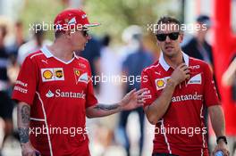 (L to R): Kimi Raikkonen (FIN) Ferrari with Sebastian Vettel (GER) Ferrari. 28.07.2017. Formula 1 World Championship, Rd 11, Hungarian Grand Prix, Budapest, Hungary, Practice Day.