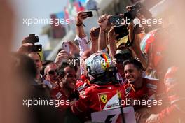 Race winner Sebastian Vettel (GER) Ferrari celebrates with the team in parc ferme. 30.07.2017. Formula 1 World Championship, Rd 11, Hungarian Grand Prix, Budapest, Hungary, Race Day.