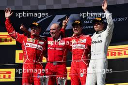The podium (L to R): Kimi Raikkonen (FIN) Ferrari, second; Jock Clear (GBR) Ferrari Engineering Director; Sebastian Vettel (GER) Ferrari, race winner; Valtteri Bottas (FIN) Mercedes AMG F1, third. 30.07.2017. Formula 1 World Championship, Rd 11, Hungarian Grand Prix, Budapest, Hungary, Race Day.