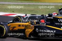 Nico Hulkenberg (GER) Renault Sport F1 Team and Kevin Magnussen (DEN) Haas F1 Team  30.07.2017. Formula 1 World Championship, Rd 11, Hungarian Grand Prix, Budapest, Hungary, Race Day.