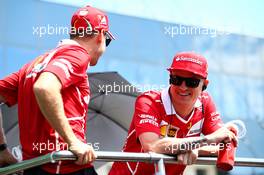 (L to R): Sebastian Vettel (GER) Ferrari with team mate Kimi Raikkonen (FIN) Ferrari on the drivers parade. 30.07.2017. Formula 1 World Championship, Rd 11, Hungarian Grand Prix, Budapest, Hungary, Race Day.
