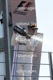 Race winner Lewis Hamilton (GBR) Mercedes AMG F1 celebrates on the podium. 03.09.2017. Formula 1 World Championship, Rd 13, Italian Grand Prix, Monza, Italy, Race Day.