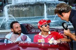 (L to R): Antonio Giovinazzi (ITA) Ferrari Development Driver with Davide Valsecchi (ITA) Sky F1 Italia Presenter at a drivers' parade in Milan. 31.08.2017. Formula 1 World Championship, Rd 13, Italian Grand Prix, Monza, Italy, Preparation Day.