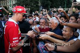 Kimi Raikkonen (FIN) Ferrari signs autographs for the fans at a drivers' parade in Milan. 31.08.2017. Formula 1 World Championship, Rd 13, Italian Grand Prix, Monza, Italy, Preparation Day.