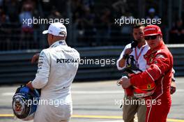 Kimi Raikkonen (FIN) Ferrari with Valtteri Bottas (FIN) Mercedes AMG F1 and Will Buxton (GBR) NBC Sports Network TV Presenter in qualifying parc ferme. 27.05.2017. Formula 1 World Championship, Rd 6, Monaco Grand Prix, Monte Carlo, Monaco, Qualifying Day.